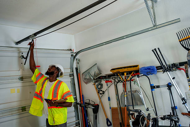 Professional Garage Door Installation technician working in Wenonah, NJ